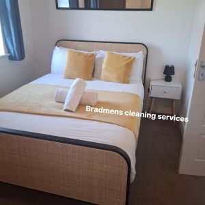 Tidy room with orange pillows